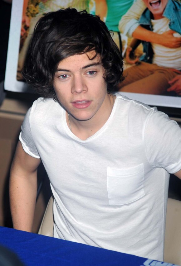 One Direction - Harry Styles - dans un magasin de disques new-yorkais, le 12 mars 2012.