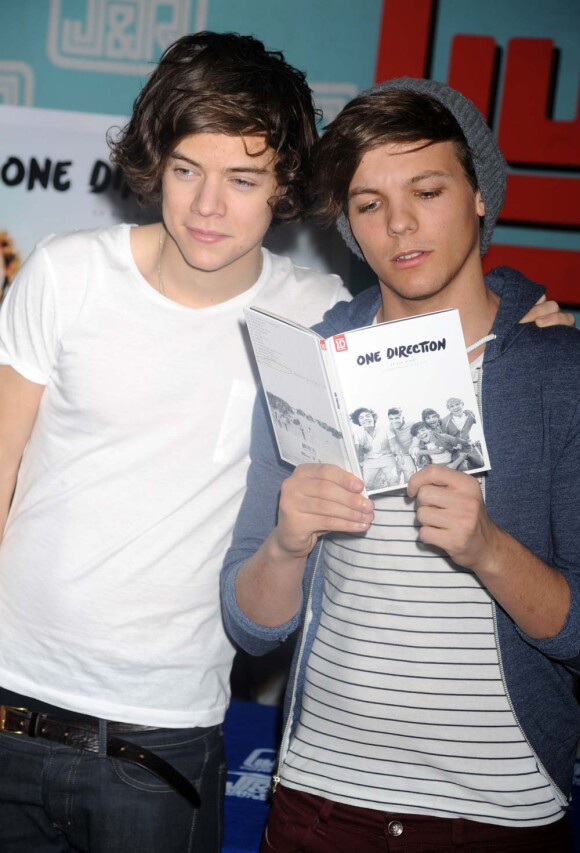 One Direction - Harry Styles et Louis Tomlinson - dans un magasin de disques new-yorkais, le 12 mars 2012.