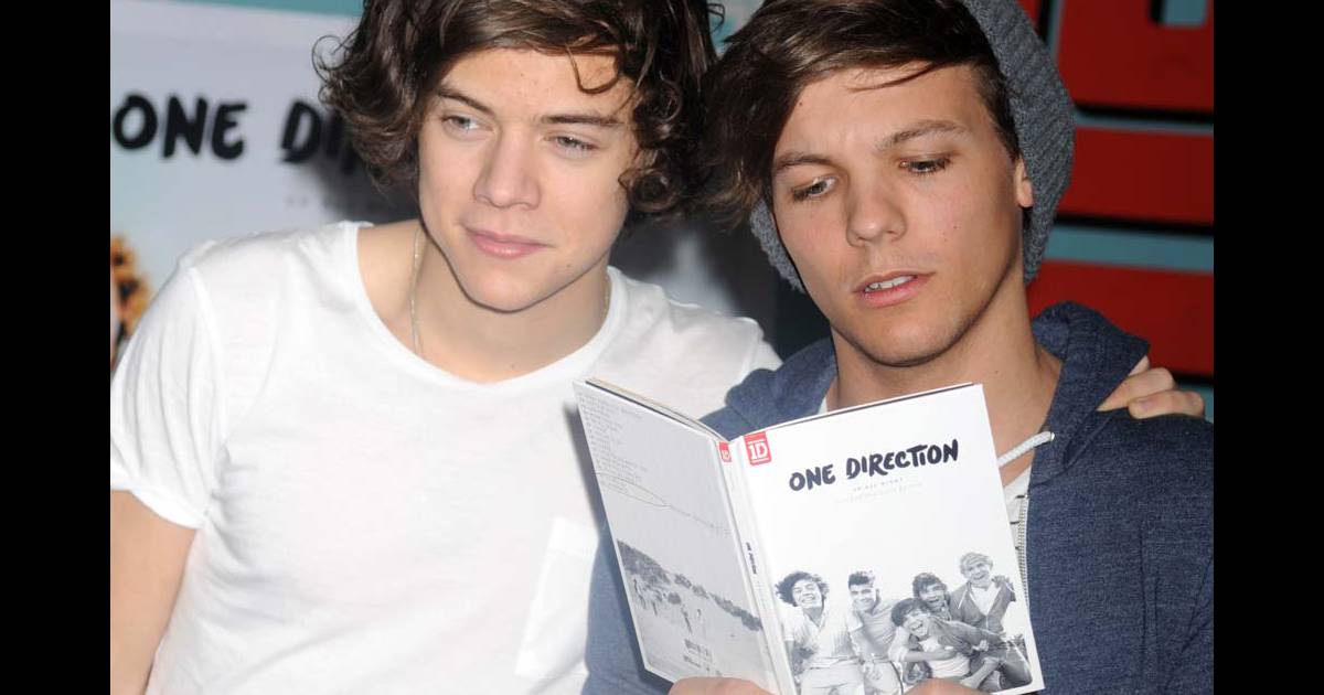 One Direction Harry Styles et Louis Tomlinson dans un magasin de disques newyorkais, le 12
