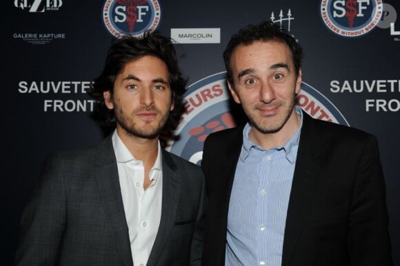 Mickael Miro et Elie Semoun lors du dîner de gala pour l'association SSF sauveteurs sans frontières, au 1515, le 12 mars 2012