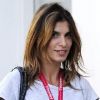 Elisabetta Canalis, dans un look digne du printemps, est en route pour le cinéma avec des amis. Los Angeles, le 14 mars 2012.