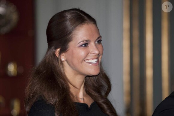 La princesse Madeleine de Suède lors du déjeuner donné le 23 mars 2012 à Drottningholm en l'honneur du prince Charles et de la duchesse Camilla.