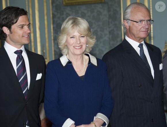 Le prince Charles et la duchesse Camilla, à Stockholm dans le cadre de leur tournée en Scandinavie pour le jubilé de diamant de la reine, étaient honorés par un déjeuner officiel au palais Drottningholm, le 23 mars 2012.