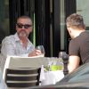 George Michael et son petit ami Fadi Fawaz le 23 mars 2012 à Paris