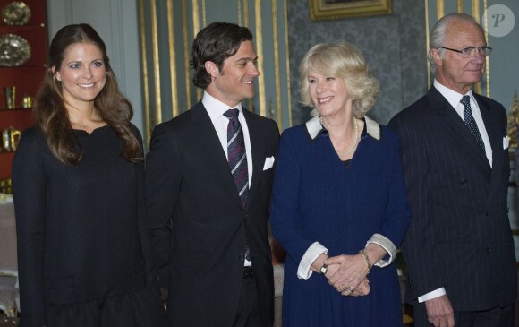 La princesse Madeleine de Suède au palais royal de Stockholm (Drottningholm) le 23 mars 2012 lors d'un déjeuner pour la visite du prince Charles et de Camilla Parker Bowles.
En mars 2012, la fille du roi Carl XVI Gustaf de Suède a tenté de répondre aux interrogations concernant ses activités et l'argent que lui verse la Suède.