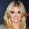 Kate Upton fait étalage de son talent de sportive durant l'événement Axe Sport Blast Combine House à New York, le 25 avril 2012.