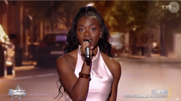 Ou bien Sarah, l'élève qui a disputé le plus de battle du top 3, et qui en a remporté une ?

Capture de l'émission Star Academy sur TF1