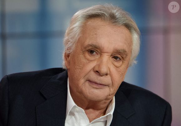 Michel Sardou est interwievé par Apolline de Malherbe sur BFMTV à Paris, France, le 27 octobre 2019. Photo par Alain Apaydin/ABACAPRESS.COM
