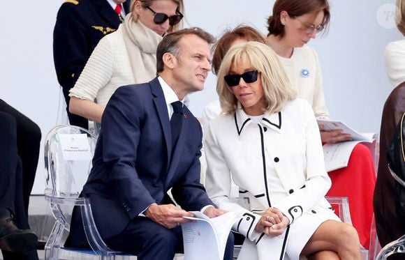 le président Emmanuel Macron, Brigitte Macron - Cérémonie du 145ème défilé militaire du 14 juillet, jour de la Fête Nationale, avenue des Champs-Elysées à Paris.
© Dominique Jacovides / Bestimage