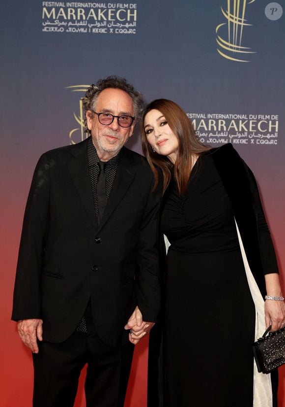 Tim Burton et Monica Bellucci au photocall de la cérémonie d'ouverture et à la projection du film "L'Ordre" lors du 21ème Festival international du film de Marrakech, le 29 novembre 2024j à Marrakech, Maroc. © Dominique Jacovides/Bestimage