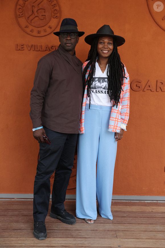 Lilian Thuram et sa femme Kareen Guiock Thuram - Célébrités au village des Internationaux de France de tennis de Roland Garros 2024 à Paris le 7 juin 2024.  © Jacovides-Moreau/Bestimage