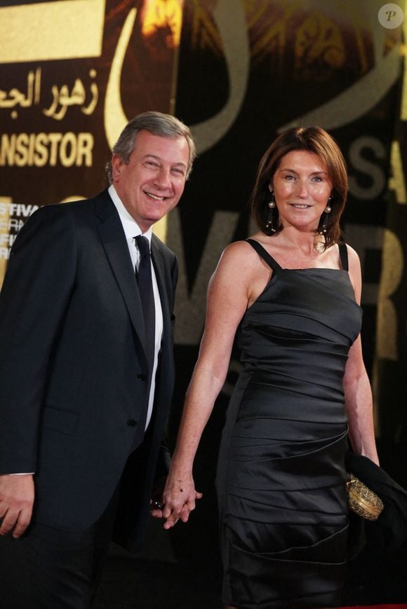 Richard Attias et Cécilia Attias se sont installés aux Etats-Unis en 2008.

Richard Attias et son épouse Cecilia Attias arrivant au 9ème 'Festival du Film de Marrakech' avant la projection de 'Chengdu, I love you' et un hommage à l'acteur américain Christopher Walken, à Marrakech, Maroc le 5 décembre 2009. Photo by Denis Guignebourg/ABACAPRESS.COM