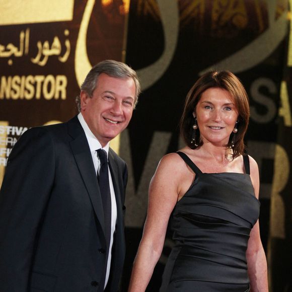 Richard Attias et Cécilia Attias se sont installés aux Etats-Unis en 2008.

Richard Attias et son épouse Cecilia Attias arrivant au 9ème 'Festival du Film de Marrakech' avant la projection de 'Chengdu, I love you' et un hommage à l'acteur américain Christopher Walken, à Marrakech, Maroc le 5 décembre 2009. Photo by Denis Guignebourg/ABACAPRESS.COM