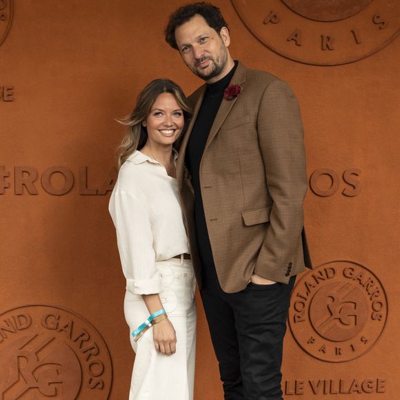 Éric Antoine et sa compagne Gennifer Demey au village lors des Internationaux de France de Tennis de Roland Garros 2025, à Paris, France, le 7 juin 2025. © Cyril Moreau/Bestimage