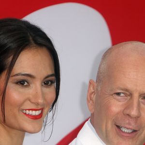 Bruce Willis et Emma Heming à la première de "Red 2" à Westwood, le 11 juillet 2013. 

Photo : Fameflynet / Bestimage
