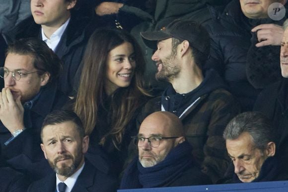 Exclusif - Louis Sarkozy et sa femme Natali Husic en tribunes du match de Ligue 1 Uber Eats "PSG contre Reims" (1-1) au Parc des Princes, le 29 janvier 2023. Photo : Agence / Bestimage