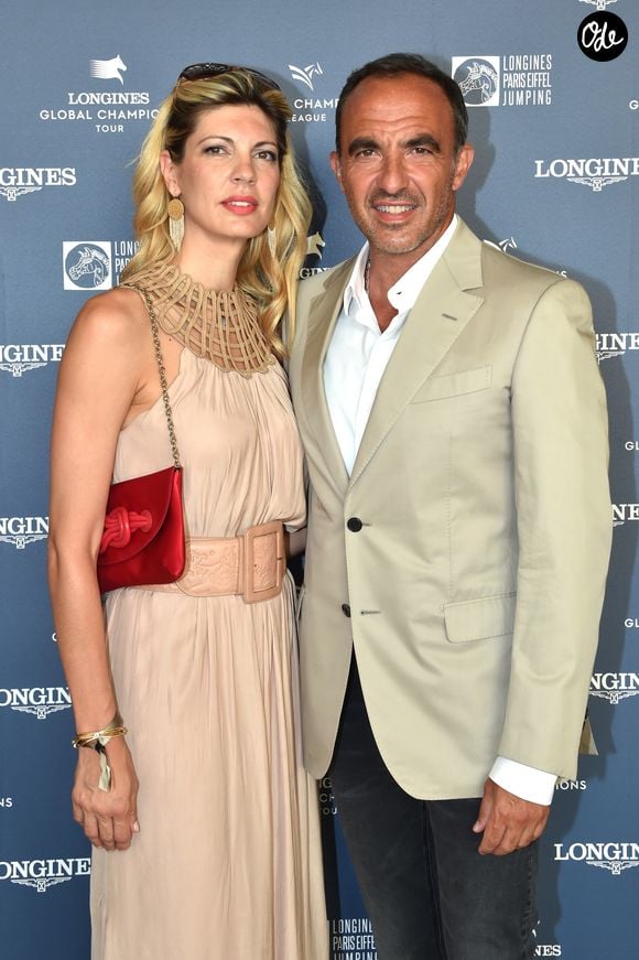 Exclusif - Nikos Aliagas et sa compagne Tina Grigoriou - Photocall du Longines Paris Eiffel Jumping au Champ de Mars à Paris le 7 juillet 2018. ©Veeren-Perusseau/Bestimage