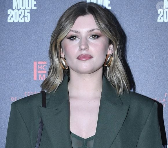 Marine, gagnante de la dernière saison de la "Star Academy", est nommée dans la catégorie "Révélation Féminine" de l'année.

Marine Delplace au photocall du 22ème dîner de la mode pour le Sidaction à Paris, le 30 janvier 2025.

Photo : Rachid Bellak / Bestimage