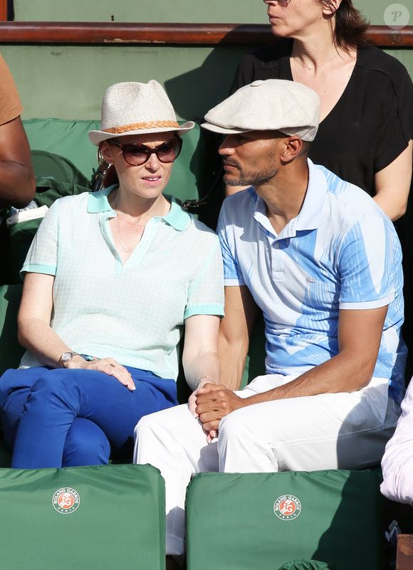 Audrey Fleurot et son nouveau compagnon Djibril Glissant assistent à la finale dame lors des Internationaux de France de tennis de Roland Garros à Paris le 7 juin 2014.   Gorassini / Jacovides / Bestimage