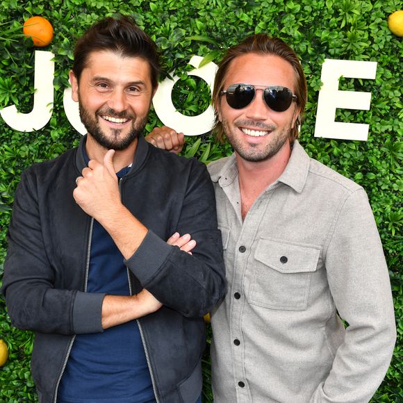 Christophe Beaugrand et son mari Ghislain Gerin - Soirée d’anniversaire des 5 ans de la marque Joone, sur la péniche La Barge à Issy-les-Moulineaux. Paris, le 30 juin 2022
© Veeren / Bestimage