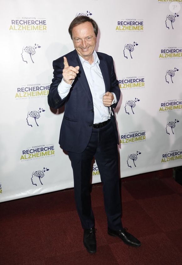Michel-Édouard Leclerc - Photocall du XVème gala pour la Fondation Recherche Alzheimer à l'Olympia à Paris le 14 mars 2022. Sous la direction artistique de P. Souchon, des grands noms de la chanson française se mobilisent autour d'un concert sur le thème " 2 générations chantent pour la 3ème". L'intégralité des bénéfices de cette soirée servira à financer la recherche sur la maladie d'Alzheimer. © Photo Marc Ausset-Lacroix/Bestimage