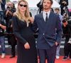 L'Inconnue concourt pour la Palme d'Or face à 21 autres films.


Virginie Efira et son compagnon Niels Schneider - Montée des marches du film " L'inconnue" lors du 79ème Festival International du Film de Cannes, le 18 mai 2026. © Jacovides-Moreau / Bestimage