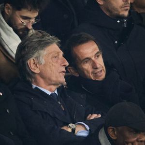 Nicolas de Tavernost, Alexandre Bompar - Célébrités dans les tribunes lors du match de Ligue 1 McDonald's opposant le Paris Saint-Germain (PSG) à l'Olympique de Marseille (OM) - (3-1) au Parc des Princes à Paris le 16 mars 2025. © Cyril Moreau/Bestimage