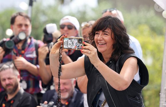 Romane Bohringer au photocall de "Dites-lui que je l'aime" (Séance spéciale) lors du 78ème Festival International du Film de Cannes, le 19 mai 2025. © Jacovides / Moreau / Bestimage