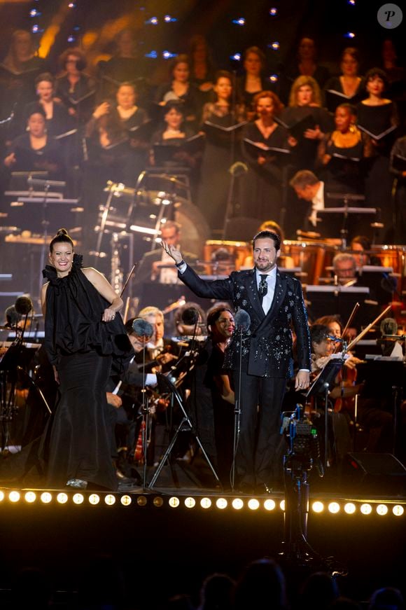 Exclusif - Julie Fuchs, Florian Sempey - 13ème édition du Concert de Paris aux pieds de la Tour Eiffel à l’occasion de la fête nationale du 14 juillet proposé par Radio France, France Télévisions, la Ville de Paris, et Électron Libre Productions.

© Perusseau / Clovis / Bestimage