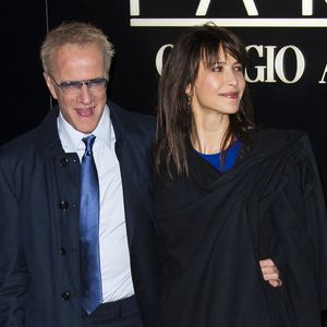 Christophe Lambert et Sophie Marceau arrivent au défilé de la collection Haute-Couture printemps-été 2014 de Giorgio Armani qui s'est tenu au Palais de Tokyo, à Paris, France, le 21 janvier 2014. Photo Nicolas Genin/ABACAPRESS.COM