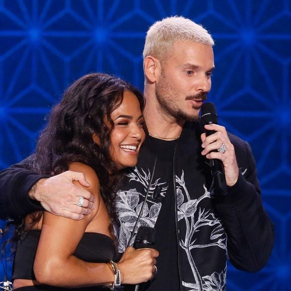 Depuis sa rencontre avec Christina Milian à Saint-Tropez, M. Pokora partage sa vie entre la France et les États-Unis tout en construisant une famille unie.

Exclusif - M. Pokora (Matt Pokora) et sa femme Christina Milian - Surprises - Enregistrement de l'émission "La boîte à secrets N°17", présentée par F.Bollaert et diffusée sur France 3
© Christophe Clovis / Bestimage