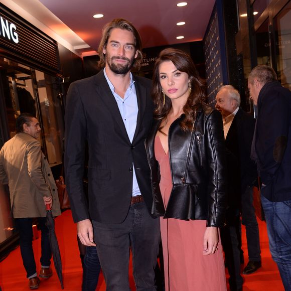 Camille Lacourt et sa compagne Alice Detollenaere (Miss Bourgogne 2010) lors de la soirée de réouverture de la boutique "Breitling", située rue de la Paix. Paris, le 3 octobre 2019.
© Rachid Bellak/Bestimage