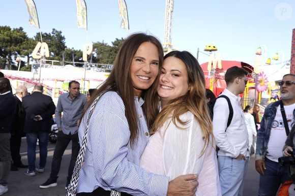 Nathalie Marquay Pernaut avec sa fille Lou Pernaut - Inauguration de la Foire du Trône 2025 à Paris le 4 avril 2025. © Cédric Perrin/Bestimage