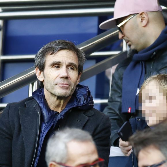 David Pujadas et son fils Adam dans les tribunes du match de Ligue 1 Conforama  PSG 5-0 Montpellier au Parc des Princes à Paris le 1 février 2020

 © Gwendoline Le Goff / Panoramic / Bestimage