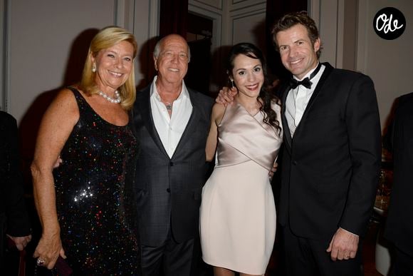 Exclusif - Corinne Bouygues et son mari le realisateur Sergio Gobbi, Candice Hugo avec son mari Christophe Dardeau - Mariage de Candice Hugo (fille de Nicole Coullier) et Christophe Dardeau a la mairie du 16eme arrondissement de Paris suivi d'un diner a l'Hotel de Sers a Paris le mercredi 18 decembre 2013. © AGENCE / BESTIMAGE