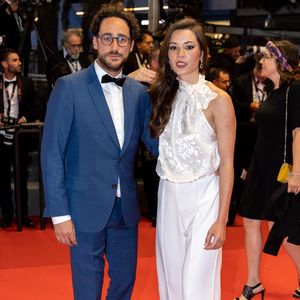 Thomas Hollande, sa femme Emilie Broussouloux - Montée des marches du film "R.M.N." lors du 75ème Festival International du Film de Cannes, le 21 mai 2022.
© Cyril Moreau / Bestimage