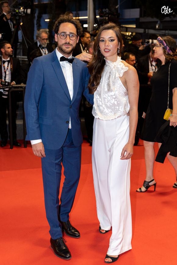Thomas Hollande, sa femme Emilie Broussouloux - Montée des marches du film "R.M.N." lors du 75ème Festival International du Film de Cannes, le 21 mai 2022.
© Cyril Moreau / Bestimage