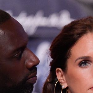 Omar Sy, et Helene Sy, sa femme, au premier rang lors du défilé Louis Vuitton Menswear Fall/Winter 2024-2025 dans le cadre de la semaine de la mode à Paris le 16 janvier 2024 à Paris, France. Photo de Jana Call me J/ABACAPRESS.COM