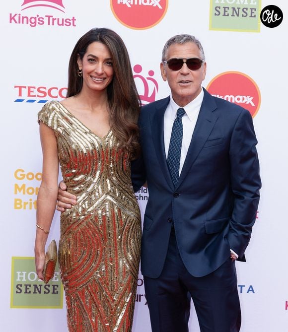 George Clooney, son épouse Amal Clooney et la mère de cette dernière, Baria Alamuddin, assistent à la célébration du King's Trust, organisée le 11 mai 2026 au Royal Albert Hall, à Londres, au Royaume-Uni. © Backgrid UK/Bestimage