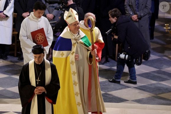 L'archevêque de Paris, Laurent Ulrich, assiste à la cérémonie d'ouverture des portes lors de la réouverture officielle de la cathédrale Notre-Dame de Paris, France, le 7 décembre 2024, après plus de cinq ans de travaux de reconstruction suite à l'incendie d'avril 2019. Photo by Dominique Jacovides/Pool/ABACAPRESS.COM