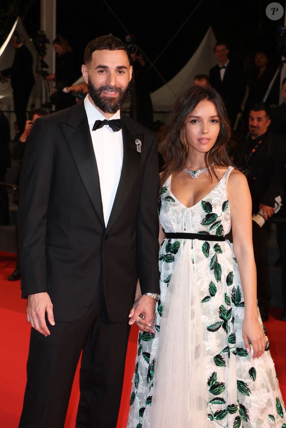 Si cette année, la jolie brune de 32 ans en a profité pour officialiser son couple avec le footballeur Karim Benzema, elle est aussi présente pour le film "Les aigles de la République", de Tarik Saleh

Karim Benzema et sa compagne Lyna Khoudri lors de la montée des marches du film « 13 jours 13 nuits » lors du 78ème Festival International du Film de Cannes. Le 23 mai 2025 
© Jacovides-Moreau / Bestimage