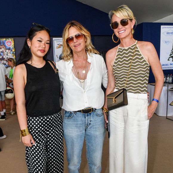Exclusif -  Laeticia Hallyday avec sa fille Joy et Virginie Coupérie-Eiffel dans l'Espace VIP lors de la 9ème édition du "Longines Paris Eiffel Jumping" au Champ de Mars à Paris, France, le 25 juin 2023. © Perusseau-Veeren/Bestimage