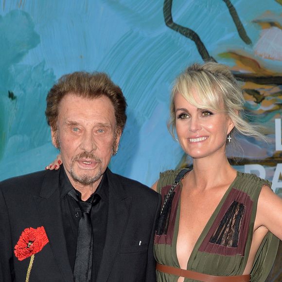 Exclusif - Johnny Hallyday et sa femme Laeticia Hallyday - Soirée au profit de l'Association "La Bonne étoile" de Laeticia Hallyday lors du 3ème Longines Paris Eiffel Jumping à la plaine de Jeux de Bagatelle à Paris le 1er juillet 2016 dans le Pavillon Eiffel du Longines Paris Eiffel Jumping décoré par Luxury Living. © Olivier Borde / Veeren / Bestimage