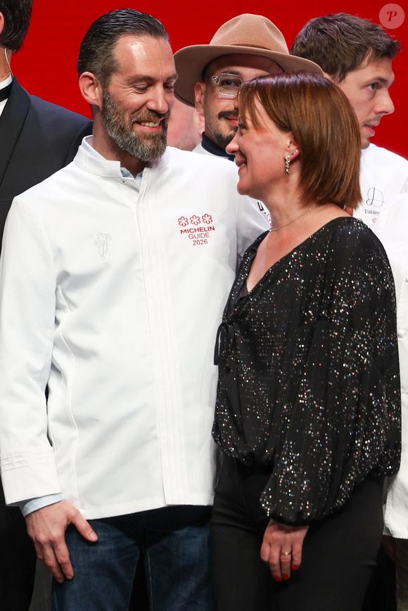 Épaulé par son épouse Ingrid, il y propose une cuisine de terroir exceptionnelle et accessible, sublimant l'intensité des goûts.

3 étoiles - "Les Morainières" - restaurant du Chef Michaël Arnoult et de sa femme Ingrid à Jongieux (73) décroche une 3eme étoile - Cérémonie des remises des Etoiles Michelin 2026 au Grimaldi Forum à Monaco le 16 mars 2026. 1 étoile, 7 nouveaux 2 étoiles et 1 nouveau 3 étoiles pour l'édition 2026 © Jean-Marc Lhomer/Bestimage