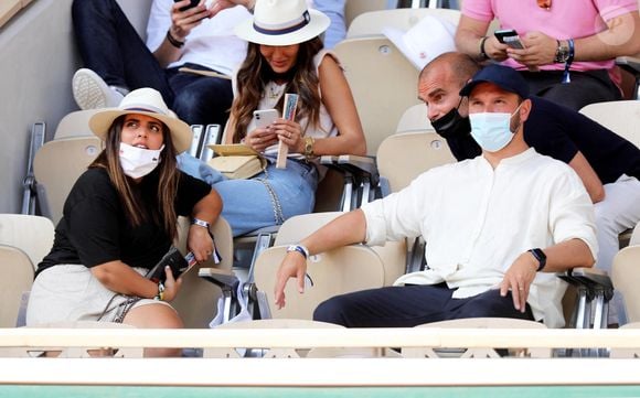 Inés Reg et son compagnon Kevin Debonne - People dans les tribunes des Internationaux de France de Tennis de Roland Garros à Paris. Le 10 juin 2021
Dominique Jacovides / Bestimage