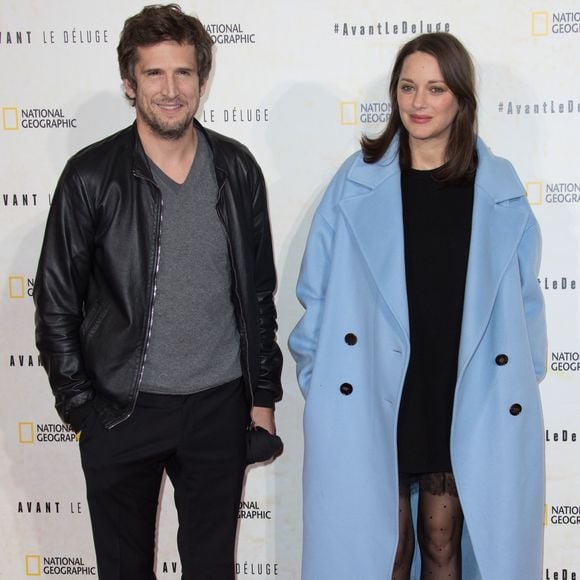 Marion Cotillard (enceinte) et son compagnon Guillaume Canet - Avant première du documentaire "Before the flood" au théâtre du Chatelet à Paris le 17 octobre 2016. © Cyril Moreau/Bestimage