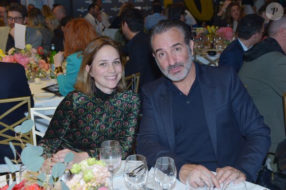 Jean Dujardin et Nathalie Péchalat (nouvelle présidente de l'association "Premiers de Cordée") - Dîner de charité Breitling à la Samaritaine pour l’association "Premiers de Cordée" à Paris le 4 avril 2024. © Rachid Bellak/Bestimage