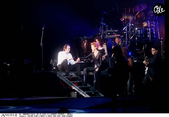Archives - Céline Dion et Jean-Jacques Goldman lors du concert de Céline Dion au Stade de France à Paris.
Crédit : AGENCE / BESTIMAGE