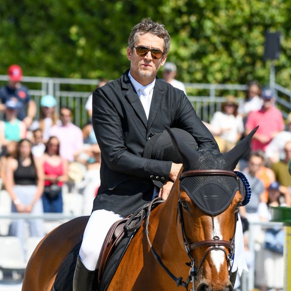 Guillaume Canet sur James Bond du Bec (6eme) lors du prix Geberit lors de la 9ème édition du "Longines Paris Eiffel Jumping" au Champ de Mars à Paris, France, le 25 juin 2023. © 
Perusseau-Veeren/Bestimage