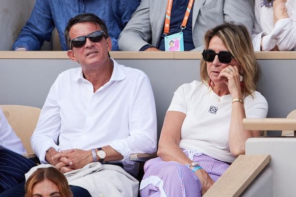 Ensuite, ils se sont dirigés vers l’île de Minorque, pour célébrer leurs noces sur trois jours

Manuel Valls et sa femme Susana Gallardo Torrededia - Célébrités en tribunes des Internationaux de France de tennis de Roland Garros 2023 à Paris le 11 juin 2023. © Jacovides-Moreau/Bestimage